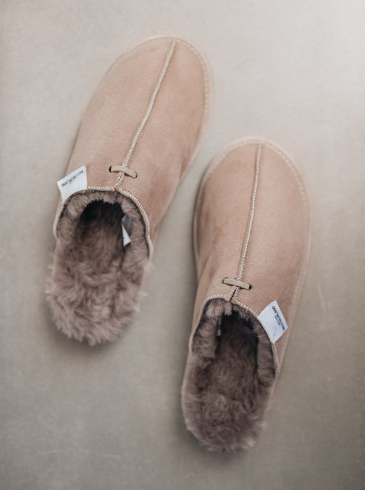 stone grey coloured slip on sheepskin slippers shown from above
