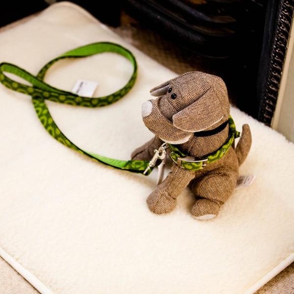 green wool dog lead and collar shown on stuffed toy dog
