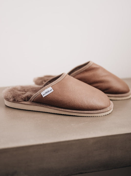 Men's slip on sheepskin slippers in a stone colour, featuring a hard foam sole and napa finish