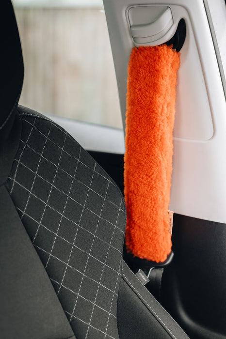 Orange sheepskin car seat cover