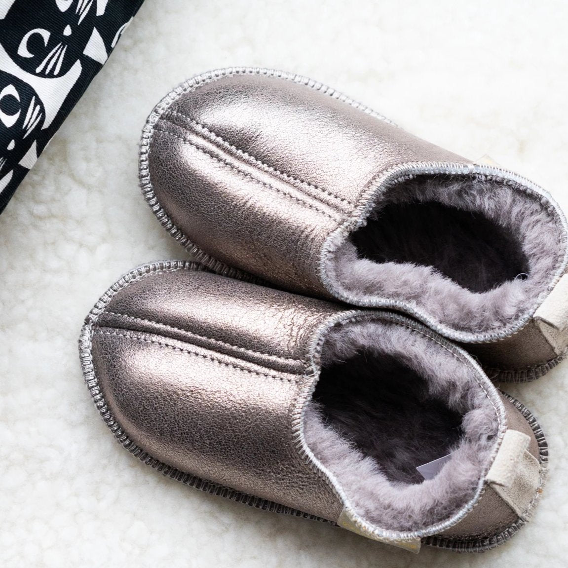 Margot children's Sheepskin Petwer grey soft soled slippers.