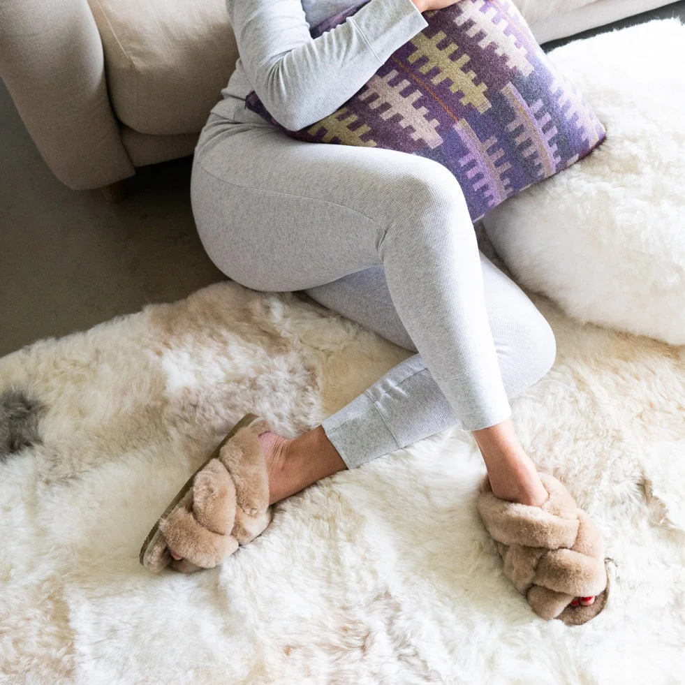 Patchwork Melange Designer rug. Features a female model wearing Gabriella in Honey.