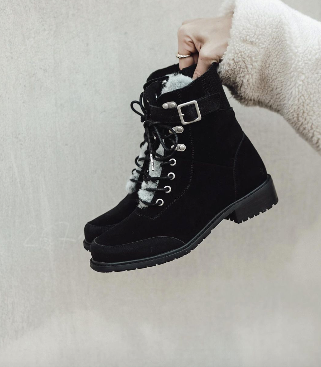 Black Waldron buckled lace-up boots. Featuring a hard wearing sole and a sheepskin inner.
