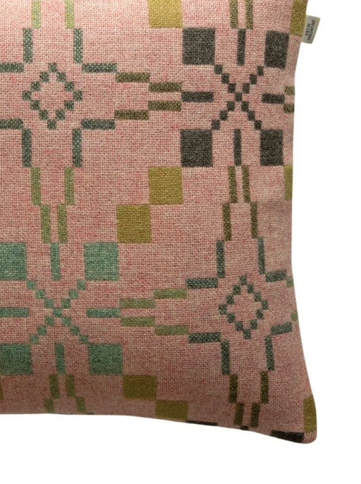 vintage star patterned wool cushion in blossom pink and green