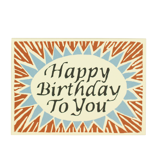 Happy Birthday Card. A horizontal card, features a rusty orange and blue spiky star shaped background. In the centre of the card reads 'Happy Birthday To You' in black illustrated writing. Comes with an envelope.
