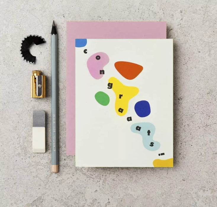 "Congrats!" Greetings Card. A White Vertical Rectangular Card. Features abstract colourful shapes with the caption "congraaats!" in black letters. Comes with an envelope.