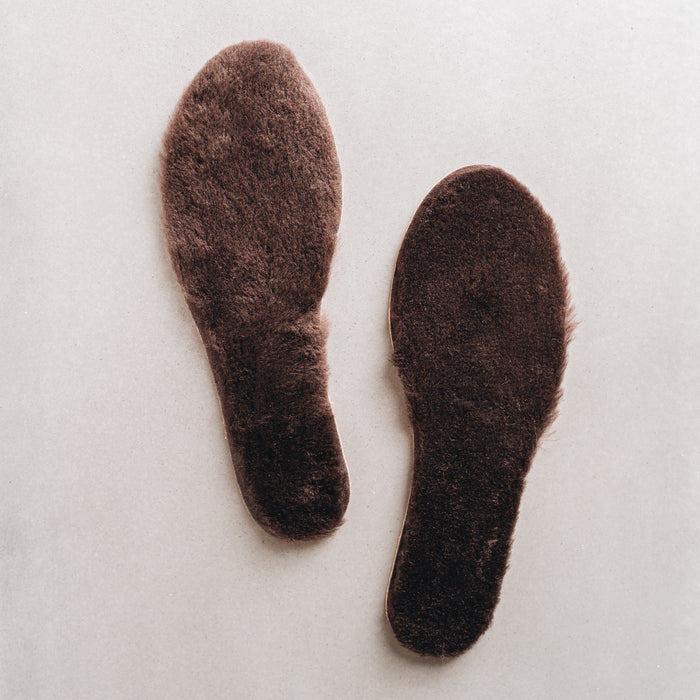 Brown colour Sheepskin Children's Cuttable Insoles. Cut to size. Insoles layed out to show Sheepskin material.