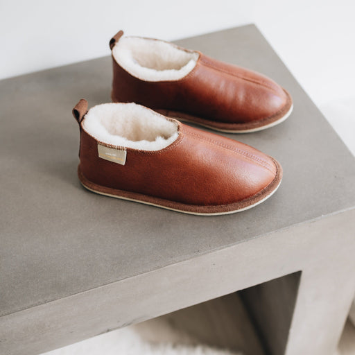 Frankie Women's Sheepskin Slippers from Westmorland Sheeepskins. A warm brandy colour outer with white sheepskin lining.