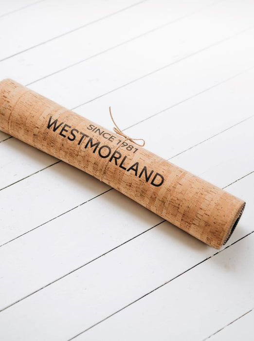 A Yoga mat of natural latex rubber, topped with soft and sustainable Portuguese cork from Westmorland Sheepskins