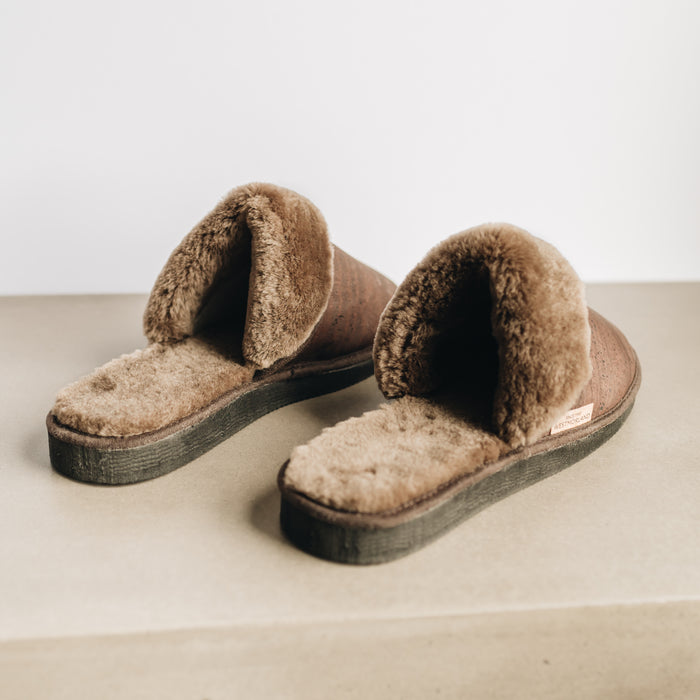 AW22 Hazel Brown Cork and Sheepskin Slider Slipper. Men's Sheepskin Slippers, with Hazel Brown Cork Outer Material, fold over Sheepskin Cuff and dark outer sole. With small branded Westmorland Sheepskin Cork tag.