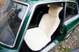 Cream Natural Sheepskin Car Seat Cover in a vintage green car.