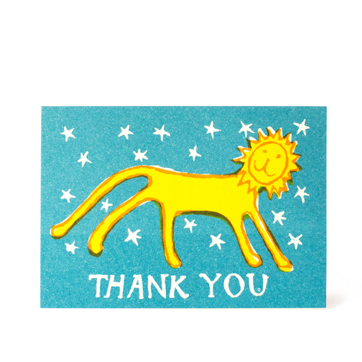 Little Lion Small Thank you Card. A small horizontal card, features a teal background with white stars. At the centre of the card is a yellow lion. Underneath reads 'Thank You'.