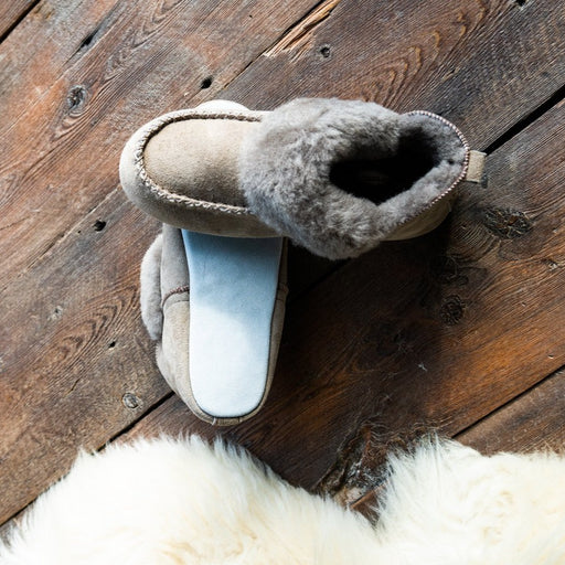 Adriana style slipper in Stone colour on a wooden floor Women's Sheepskin Slipper by Shepherd of Sweden