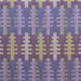 Close up of Forest woven wool textiles by Melin Tregwynt. Features tree like shapes in green and lilacs set against an indigo and lilac striped background.